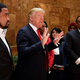 Pastor Darrell Scott (left) listens as then-Republican presidential candidate Donald Trump speaks in Trump Tower in New York City on April 18, 2016. (Richard Drew, File/AP Images)